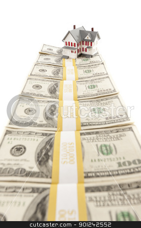 To use this stock image in your creative project, please select the size you need over to the right and click the "Add to Cart" button.
Your downloaded image will come with the Cutcaster watermark removed so don’t worry about the watermark you see on this page. Small House on Row of Hundred Dollar Bill Stacks stock photo, Small House on Row of Hundred Dollar Bill Stacks Isolated on a White Background. by Andy Dean