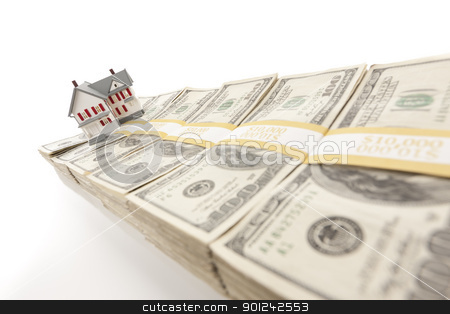 To use this stock image in your creative project, please select the size you need over to the right and click the "Add to Cart" button.
Your downloaded image will come with the Cutcaster watermark removed so don’t worry about the watermark you see on this page. Small House on Row of Hundred Dollar Bill Stacks stock photo, Small House on Row of Hundred Dollar Bill Stacks Isolated on a White Background. by Andy Dean