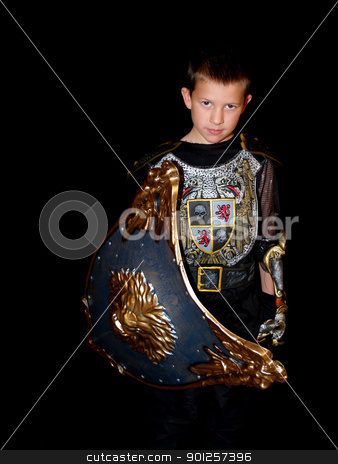 To use this stock image in your creative project, please select the size you need over to the right and click the "Add to Cart" button.
Your downloaded image will come with the Cutcaster watermark removed so don’t worry about the watermark you see on this page. Child in a costume stock photo, Little boy in a dark knight costume with a shield by Cora Reed