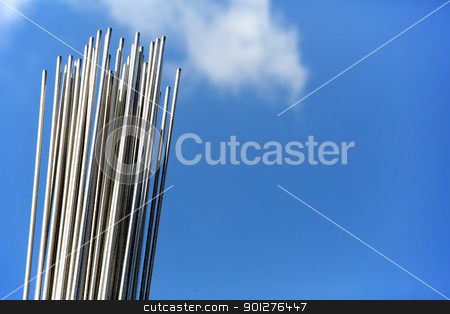 To use this stock image in your creative project, please select the size you need over to the right and click the "Add to Cart" button.
Your downloaded image will come with the Cutcaster watermark removed so don’t worry about the watermark you see on this page. Steel rods in the Sky stock photo, A bunch of stainless steel rods against a blue sky and whispy clouds by bobkeenan