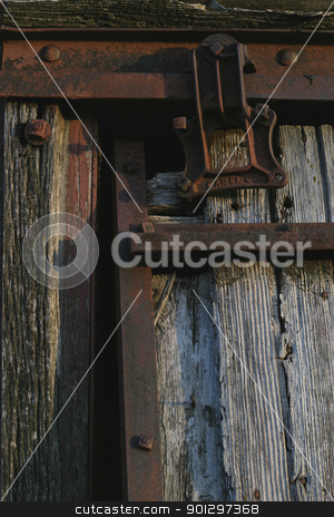To use this stock image in your creative project, please select the size you need over to the right and click the "Add to Cart" button.
Your downloaded image will come with the Cutcaster watermark removed so don’t worry about the watermark you see on this page. Rusted Sliding Door stock photo, Old hanging door rusted and weathered by Tyler Olson