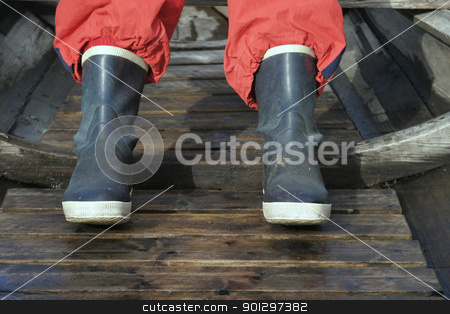 To use this stock image in your creative project, please select the size you need over to the right and click the "Add to Cart" button.
Your downloaded image will come with the Cutcaster watermark removed so don’t worry about the watermark you see on this page. Rubber Boots stock photo, rubber boot detail in an old vintage fishing boat. by Tyler Olson