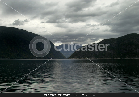 To use this stock image in your creative project, please select the size you need over to the right and click the "Add to Cart" button.
Your downloaded image will come with the Cutcaster watermark removed so don’t worry about the watermark you see on this page. Western Norway Fjord stock photo, A fjord in western norway by Tyler Olson