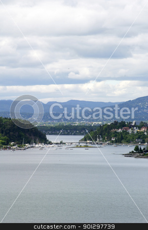 To use this stock image in your creative project, please select the size you need over to the right and click the "Add to Cart" button.
Your downloaded image will come with the Cutcaster watermark removed so don’t worry about the watermark you see on this page. Oslo fjord stock photo, Oslo Fjord in early summer viewed form Ljan train station. by Tyler Olson