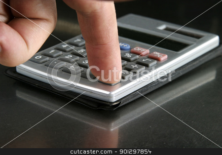 To use this stock image in your creative project, please select the size you need over to the right and click the "Add to Cart" button.
Your downloaded image will come with the Cutcaster watermark removed so don’t worry about the watermark you see on this page. Calculator Detail stock photo, Small personal calculator detail with a finger pressing the equals sign by Tyler Olson