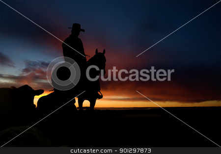 To use this stock image in your creative project, please select the size you need over to the right and click the "Add to Cart" button.
Your downloaded image will come with the Cutcaster watermark removed so don’t worry about the watermark you see on this page. Cowboy Silhouette stock photo, A cowboy on a hill against a sunset by Tyler Olson