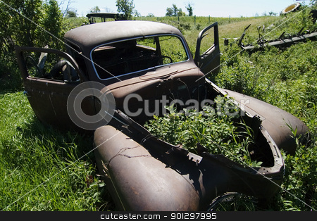 To use this stock image in your creative project, please select the size you need over to the right and click the "Add to Cart" button.
Your downloaded image will come with the Cutcaster watermark removed so don’t worry about the watermark you see on this page. Rusted Prairie Car stock photo, An old rusted out car on the prairie landscape by Tyler Olson