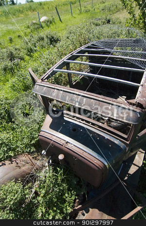 To use this stock image in your creative project, please select the size you need over to the right and click the "Add to Cart" button.
Your downloaded image will come with the Cutcaster watermark removed so don’t worry about the watermark you see on this page. Rusted Prairie Car stock photo, An old rusted out car on the prairie landscape by Tyler Olson