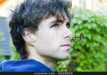 To use this stock image in your creative project, please select the size you need over to the right and click the "Add to Cart" button.
Your downloaded image will come with the Cutcaster watermark removed so don’t worry about the watermark you see on this page. Happy Male stock photo, A young male looks up with a slight smile by Tyler Olson