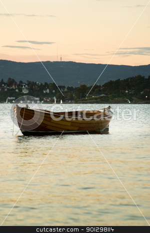 To use this stock image in your creative project, please select the size you need over to the right and click the "Add to Cart" button.
Your downloaded image will come with the Cutcaster watermark removed so don’t worry about the watermark you see on this page. Boat in Sunset stock photo, Boat at sunset on the norwegian coast, in the Oslo fjord. by Tyler Olson