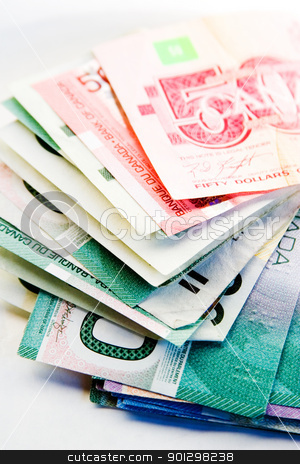 To use this stock image in your creative project, please select the size you need over to the right and click the "Add to Cart" button.
Your downloaded image will come with the Cutcaster watermark removed so don’t worry about the watermark you see on this page. Canadian Bills stock photo, Canadian bills on a white background. by Tyler Olson