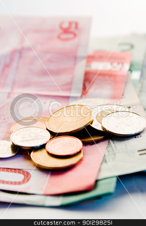 To use this stock image in your creative project, please select the size you need over to the right and click the "Add to Cart" button.
Your downloaded image will come with the Cutcaster watermark removed so don’t worry about the watermark you see on this page. Canadian Bills and Coins stock photo, An assortment of Canadian bills and coins with the focus on the coins. by Tyler Olson