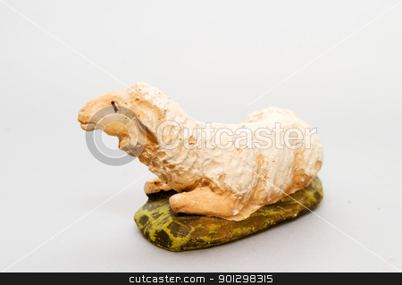 To use this stock image in your creative project, please select the size you need over to the right and click the "Add to Cart" button.
Your downloaded image will come with the Cutcaster watermark removed so don’t worry about the watermark you see on this page. Sheep Nativity Figurine stock photo, A sheep figure from an old nativity set. by Tyler Olson