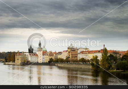 To use this stock image in your creative project, please select the size you need over to the right and click the "Add to Cart" button.
Your downloaded image will come with the Cutcaster watermark removed so don’t worry about the watermark you see on this page. Prague Scenic stock photo, The old town bridge and tower in the background behind some buildings in old town Prague by Tyler Olson