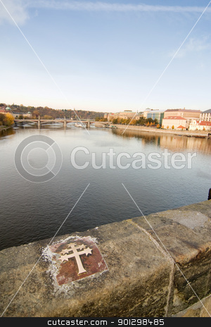 To use this stock image in your creative project, please select the size you need over to the right and click the "Add to Cart" button.
Your downloaded image will come with the Cutcaster watermark removed so don’t worry about the watermark you see on this page. Charles Bridge Cross stock photo, Cross of St Jan Nepomucky where he was allegedly thrown over the bridge to his death by Tyler Olson
