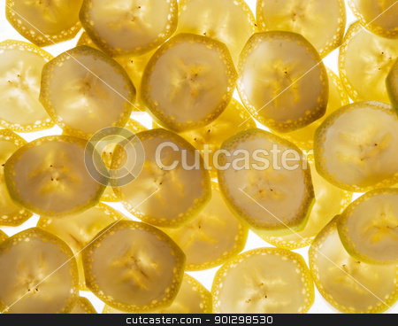 To use this stock image in your creative project, please select the size you need over to the right and click the "Add to Cart" button.
Your downloaded image will come with the Cutcaster watermark removed so don’t worry about the watermark you see on this page. Banana Slice Background stock photo, Banana slice texture image by Tyler Olson