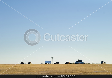 To use this stock image in your creative project, please select the size you need over to the right and click the "Add to Cart" button.
Your downloaded image will come with the Cutcaster watermark removed so don’t worry about the watermark you see on this page. Prairie Yard stock photo, A prairie farm yard, on a very flat horizon. by Tyler Olson