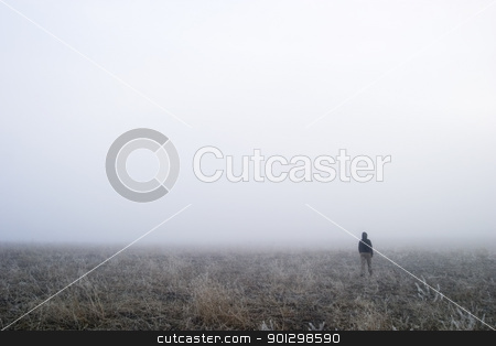 To use this stock image in your creative project, please select the size you need over to the right and click the "Add to Cart" button.
Your downloaded image will come with the Cutcaster watermark removed so don’t worry about the watermark you see on this page. Fog Walk stock photo, A person walking in the fog, disappearing into the distance. by Tyler Olson