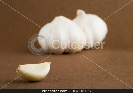To use this stock image in your creative project, please select the size you need over to the right and click the "Add to Cart" button.
Your downloaded image will come with the Cutcaster watermark removed so don’t worry about the watermark you see on this page. Garlic stock photo, Garlic (Allium sativum) cloves on a dark background by Tyler Olson