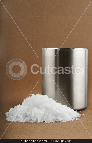 To use this stock image in your creative project, please select the size you need over to the right and click the "Add to Cart" button.
Your downloaded image will come with the Cutcaster watermark removed so don’t worry about the watermark you see on this page. Sea Salt stock photo, Bulk raw, unground sea salt on a textured brown background by Tyler Olson