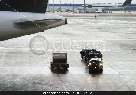 To use this stock image in your creative project, please select the size you need over to the right and click the "Add to Cart" button.
Your downloaded image will come with the Cutcaster watermark removed so don’t worry about the watermark you see on this page. Luggage Trolly stock photo, Luggage trolly driving around at an airport. by Tyler Olson