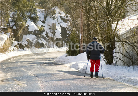 To use this stock image in your creative project, please select the size you need over to the right and click the "Add to Cart" button.
Your downloaded image will come with the Cutcaster watermark removed so don’t worry about the watermark you see on this page. Winter Walk stock photo, An old man in Oslo, Norway walking on the road in winter with walking poles. by Tyler Olson