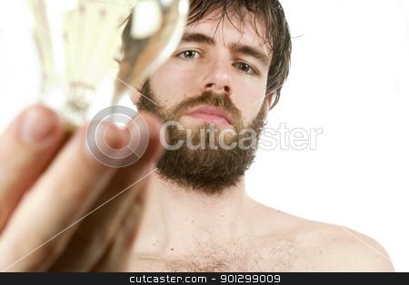 To use this stock image in your creative project, please select the size you need over to the right and click the "Add to Cart" button.
Your downloaded image will come with the Cutcaster watermark removed so don’t worry about the watermark you see on this page. Fresh New Idea stock photo, A concept image displaying a young bearded male, holding a light bulb. Fresh New Idea. by Tyler Olson
