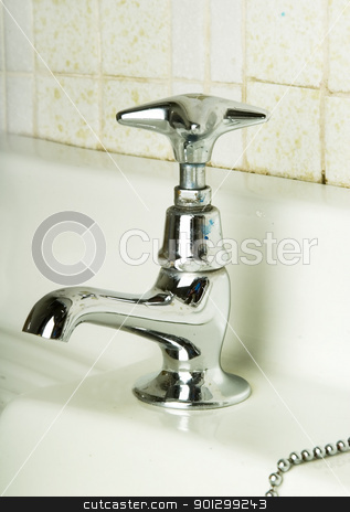 To use this stock image in your creative project, please select the size you need over to the right and click the "Add to Cart" button.
Your downloaded image will come with the Cutcaster watermark removed so don’t worry about the watermark you see on this page. Retro Tap stock photo, A retro bathroom sink tap. (vertical image) by Tyler Olson