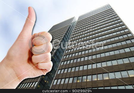 To use this stock image in your creative project, please select the size you need over to the right and click the "Add to Cart" button.
Your downloaded image will come with the Cutcaster watermark removed so don’t worry about the watermark you see on this page. Business Success stock photo, A thumbs up and a tall business building. Success in Business by Tyler Olson