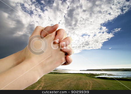 To use this stock image in your creative project, please select the size you need over to the right and click the "Add to Cart" button.
Your downloaded image will come with the Cutcaster watermark removed so don’t worry about the watermark you see on this page. Prayer stock photo, A pair of hands in a praying position set against a beautiful prairie lake landscape by Tyler Olson