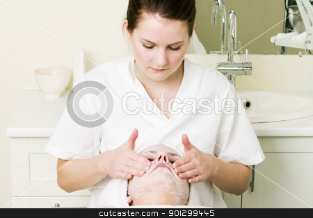 To use this stock image in your creative project, please select the size you need over to the right and click the "Add to Cart" button.
Your downloaded image will come with the Cutcaster watermark removed so don’t worry about the watermark you see on this page. Beauty Spa Massage stock photo, Lotion being massaged in during a facial at a beauty spa. by Tyler Olson