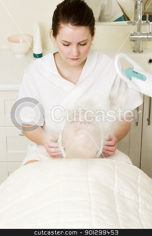 To use this stock image in your creative project, please select the size you need over to the right and click the "Add to Cart" button.
Your downloaded image will come with the Cutcaster watermark removed so don’t worry about the watermark you see on this page. Steam Treatment stock photo, Steam treatment during a facial at a beauty spa. by Tyler Olson