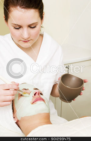 To use this stock image in your creative project, please select the size you need over to the right and click the "Add to Cart" button.
Your downloaded image will come with the Cutcaster watermark removed so don’t worry about the watermark you see on this page. Facial Mask stock photo, A detail image of a green apple mask being applied at a beauty spa. by Tyler Olson