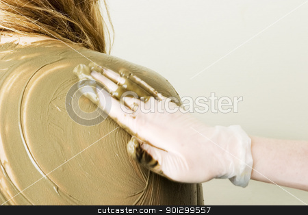 To use this stock image in your creative project, please select the size you need over to the right and click the "Add to Cart" button.
Your downloaded image will come with the Cutcaster watermark removed so don’t worry about the watermark you see on this page. Full Body Wrap stock photo, A sea mud full body wrap at a luxury spa being applied to the back and shoulders with motion blur on the hand applying the mud. by Tyler Olson