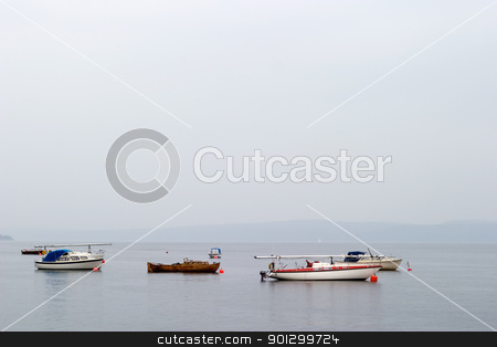 To use this stock image in your creative project, please select the size you need over to the right and click the "Add to Cart" button.
Your downloaded image will come with the Cutcaster watermark removed so don’t worry about the watermark you see on this page. Sailboats on Ocean stock photo, Oslo fjord with sail boats in the mist by Tyler Olson