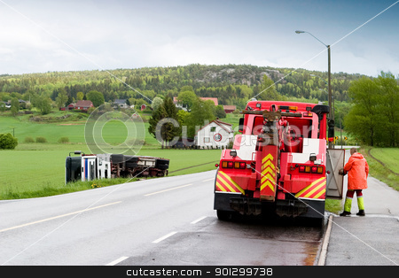 To use this stock image in your creative project, please select the size you need over to the right and click the "Add to Cart" button.
Your downloaded image will come with the Cutcaster watermark removed so don’t worry about the watermark you see on this page. Tow Truck stock photo, A tow truck arrives on the scene of an accident by Tyler Olson