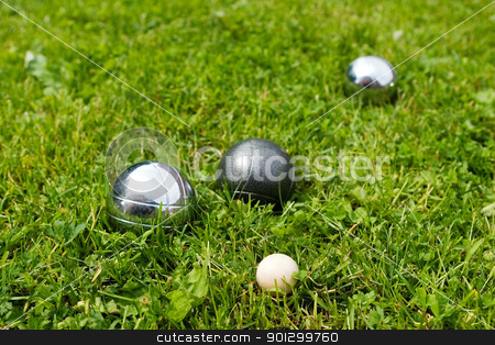To use this stock image in your creative project, please select the size you need over to the right and click the "Add to Cart" button.
Your downloaded image will come with the Cutcaster watermark removed so don’t worry about the watermark you see on this page. Bocce Balls stock photo, Bocce balls sitting in the green grass, close to the target. -shallow depth of field.- by Tyler Olson