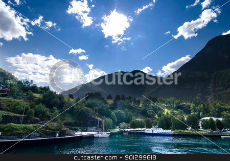 To use this stock image in your creative project, please select the size you need over to the right and click the "Add to Cart" button.
Your downloaded image will come with the Cutcaster watermark removed so don’t worry about the watermark you see on this page. Aurlandsfjord stock photo, Fjord landscape in the western area of Norway, Aurlandsfjord in Sognefjord. by Tyler Olson