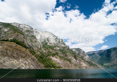 To use this stock image in your creative project, please select the size you need over to the right and click the "Add to Cart" button.
Your downloaded image will come with the Cutcaster watermark removed so don’t worry about the watermark you see on this page. Norway Fjord Scenic stock photo, Fjord Scenic from the pass between Aurlandsfjord and naeroyfjord (nryfjord), in Sognefjord, Norway by Tyler Olson