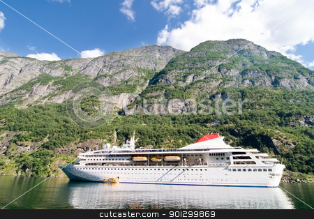To use this stock image in your creative project, please select the size you need over to the right and click the "Add to Cart" button.
Your downloaded image will come with the Cutcaster watermark removed so don’t worry about the watermark you see on this page. Sognefjord Norway Cruise stock photo, Cruise boat on the Sognefjord near Gudvangen in the western area of Norway. by Tyler Olson