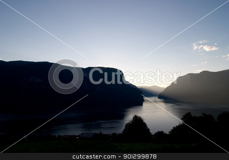 To use this stock image in your creative project, please select the size you need over to the right and click the "Add to Cart" button.
Your downloaded image will come with the Cutcaster watermark removed so don’t worry about the watermark you see on this page. Evening Fjord View stock photo, Fjord in western Norway as the sun goes down - great copyspace in the bottom area, or sky. by Tyler Olson