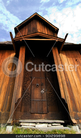 To use this stock image in your creative project, please select the size you need over to the right and click the "Add to Cart" button.
Your downloaded image will come with the Cutcaster watermark removed so don’t worry about the watermark you see on this page. Big Door stock photo, A medeival Door made of wood with carvings by Tyler Olson