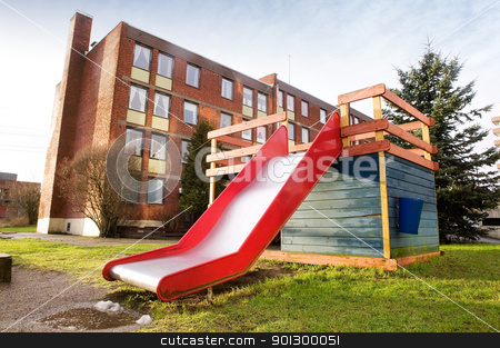 To use this stock image in your creative project, please select the size you need over to the right and click the "Add to Cart" button.
Your downloaded image will come with the Cutcaster watermark removed so don’t worry about the watermark you see on this page. Playground Slide stock photo, A playground slide and jungle gym near an apartment building by Tyler Olson