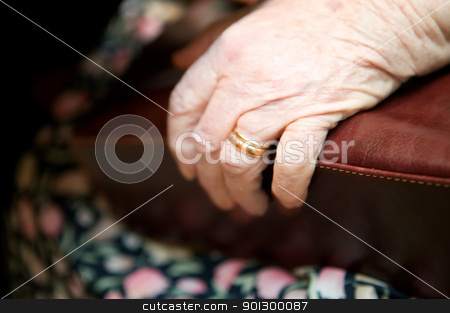 To use this stock image in your creative project, please select the size you need over to the right and click the "Add to Cart" button.
Your downloaded image will come with the Cutcaster watermark removed so don’t worry about the watermark you see on this page. Old Hand stock photo, A detail of an old womans hand on her purse by Tyler Olson
