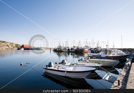 To use this stock image in your creative project, please select the size you need over to the right and click the "Add to Cart" button.
Your downloaded image will come with the Cutcaster watermark removed so don’t worry about the watermark you see on this page. Fishing Boats at Dock stock photo, A number of fishing boats sit at dock on a warm summer day. by Tyler Olson