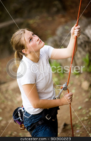 To use this stock image in your creative project, please select the size you need over to the right and click the "Add to Cart" button.
Your downloaded image will come with the Cutcaster watermark removed so don’t worry about the watermark you see on this page. Female Belayer stock photo, A female belaying a male on a steep rock face. Shallow depth of field has been used to isolated the belayer, with focus on the eyes and head. by Tyler Olson