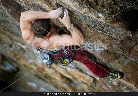 To use this stock image in your creative project, please select the size you need over to the right and click the "Add to Cart" button.
Your downloaded image will come with the Cutcaster watermark removed so don’t worry about the watermark you see on this page. Male Rock Climber stock photo, A male climber, viewed from above, climbs a very high and steep crag. by Tyler Olson