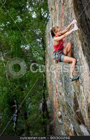 To use this stock image in your creative project, please select the size you need over to the right and click the "Add to Cart" button.
Your downloaded image will come with the Cutcaster watermark removed so don’t worry about the watermark you see on this page. Female Climber stock photo, An eager female climber on a steep rock face looks for the next hold. Shallow depth of field is used to isolated the climber with the focus on the head. by Tyler Olson