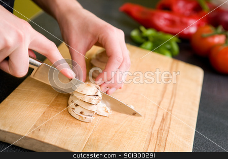 To use this stock image in your creative project, please select the size you need over to the right and click the "Add to Cart" button.
Your downloaded image will come with the Cutcaster watermark removed so don’t worry about the watermark you see on this page. Slicing Mushrooms stock photo, A detail image of a female hand slicing mushrooms for a pizza. Focus is on the hand and mushrooms while tomatoes and peppers are out of focus in the background. by Tyler Olson