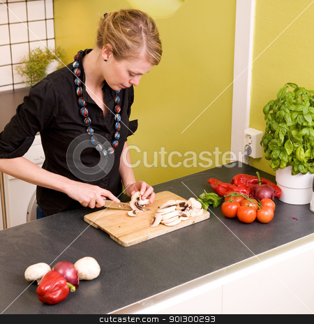 To use this stock image in your creative project, please select the size you need over to the right and click the "Add to Cart" button.
Your downloaded image will come with the Cutcaster watermark removed so don’t worry about the watermark you see on this page. Woman Cutting Vegetables stock photo, A woman cutting vegetables at home on the counter by Tyler Olson